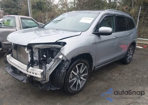 2019 Honda Pilot Touring z USA, uszkodzony, nr VIN 5FNYF5H68KB040709